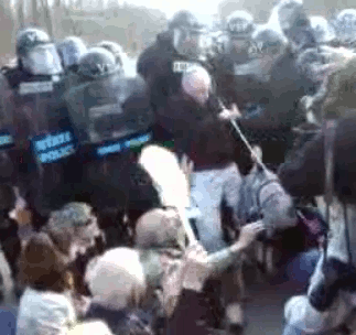 Riot police arrest elderly blind man and over 30 other people at the Bradley Manning support rally held at Quantico on 3/20/2011