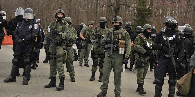 Riot police with weapons at the Bradley Manning support rally held at Quantico on 3/20/2011